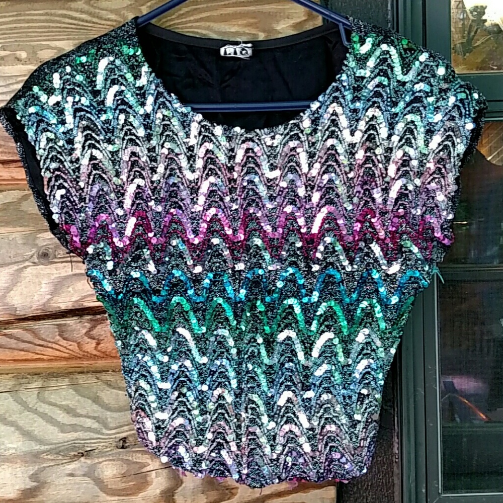 Vintage, fun sequined top!  Fits like an 8.